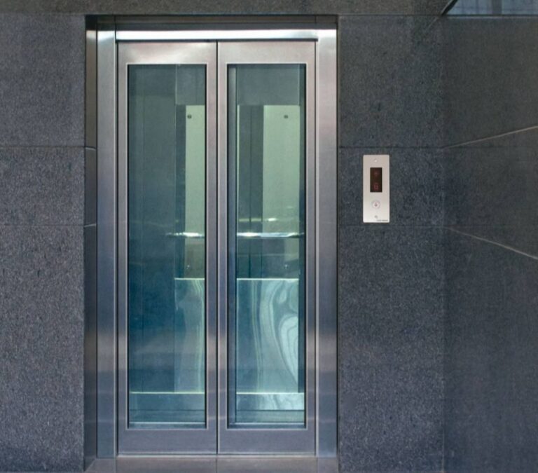 ss-and-glass-frame-big-vision-elevator-door